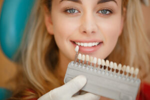 woman getting teeth whitening