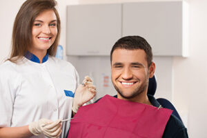 man with dental hygienists