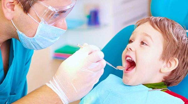 child getting a dental exam