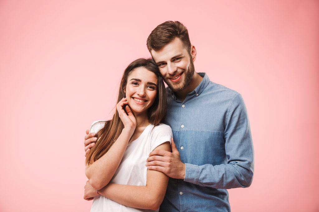 A couple posing together.