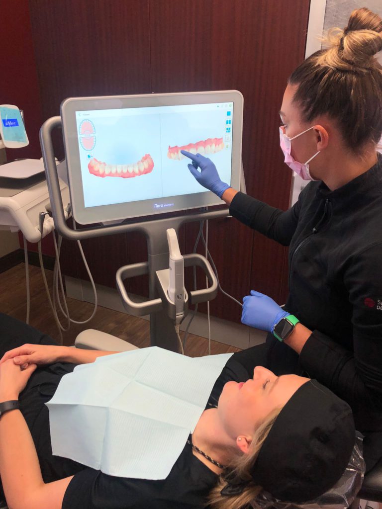 Dental staff from Springbank Dental Centre demonstrate the Itero Element Intraoral Scanner.